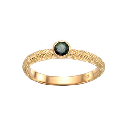 18 Karat Yellow Gold textured band with one Green Garnet in the center.