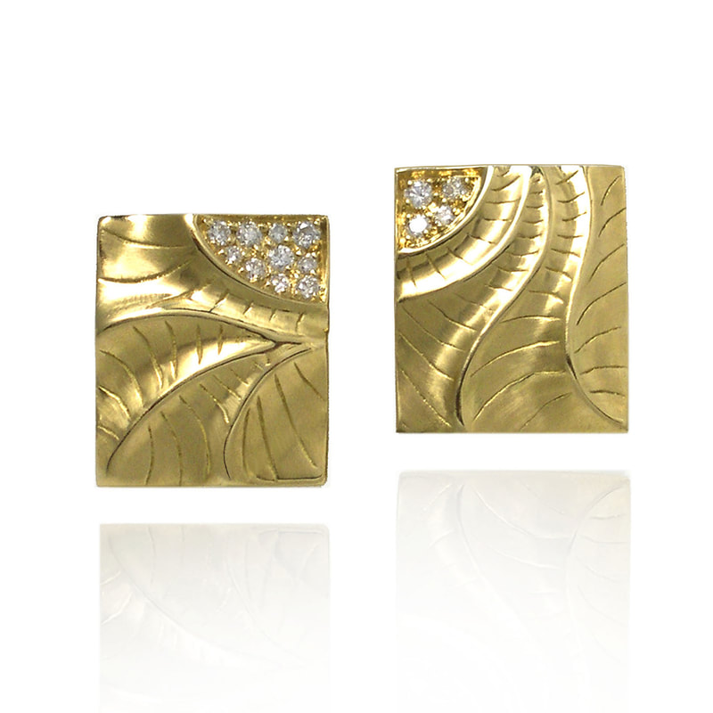 14 Karat Yellow Gold "Rectangular" Post Earrings  with curved sculpted gold with a cluster of diamonds on one corner.