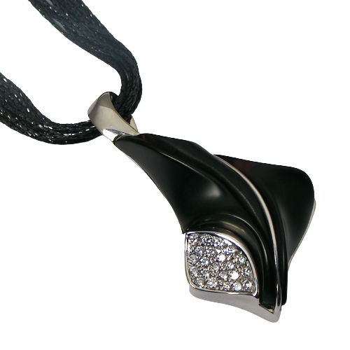 14K white gold pendant with carved Black Onyx and diamonds on a multi-chain black necklace.