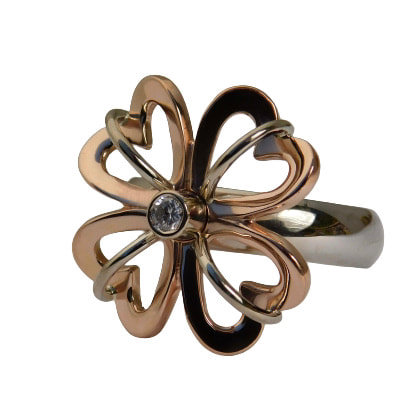 14K Yellow, Rose and White Gold "Clover" ring with a diamond in the center.