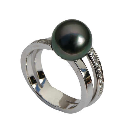 14 Karat White Gold ring with one Tahitian Black Pearl and diamonds down one side of the band.