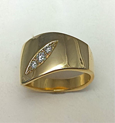 14KY Gold wide squared wide band with 3 diamonds.