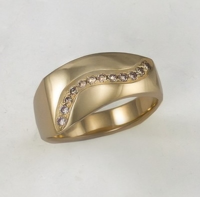 Left hand slanted band with squared top and champagne diamonds.
